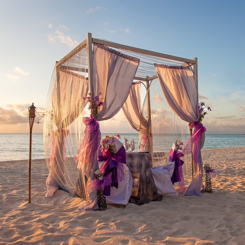 Romantic and luxurious table for two set on a tropical beach
